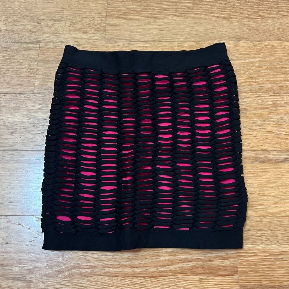 Bebe Black Cutout Bandage Mini Skirt with Pink Lining P/S Like New